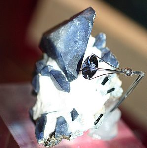 rough and faceted benitoite specimens