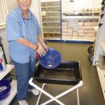 Cyndy leads gold-panning classes for kids