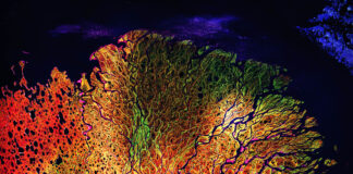 The Lena River, one of the largest rivers in the world. Satellite view colorful ultrared collage.