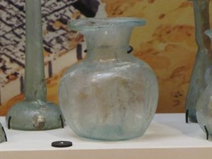 Ancient glass bottle and candlestick