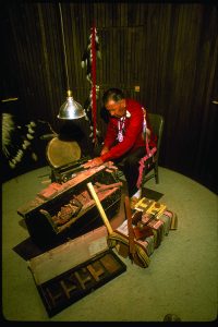 Native American craftsman working with pipestone