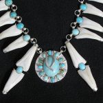 Buffalo teeth and turquoise necklace