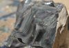 rainbow obsidian and lake county diamonds are highly collectible like this large piece of rainbow obsidian