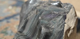rainbow obsidian and lake county diamonds are highly collectible like this large piece of rainbow obsidian