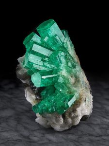 Emerald on calcite