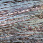 Rock Science: Minnesota’s Banded Iron Ore Iron Ore Rock. Bands of iron in raw form create colorful layers in a boulder