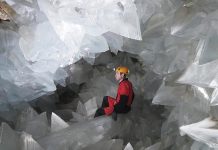 scientist inside of geoda de pulpi learning how are geodes formed by studying the interior