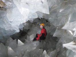 scientist inside of geoda de pulpi learning how are geodes formed by studying the interior