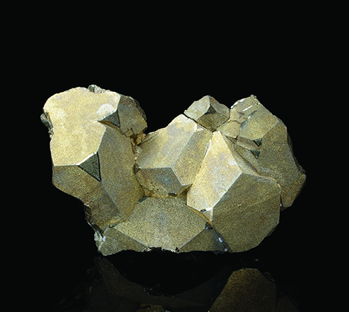 Seven pyrite crystals