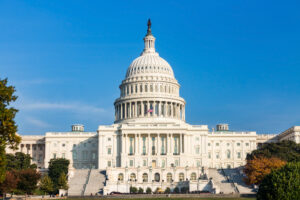 The United States capitol builing on a sunny day.