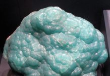 smithsonite specimen mounted in a display case