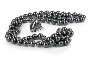 hematite ring and necklace on white background used as stones to relieve stress