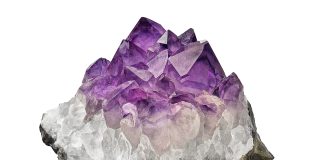 amethyst crystal cluster on white background used as stones to relieve stress