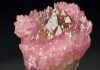 cluster of pink quartz with yellow citrine in the middle