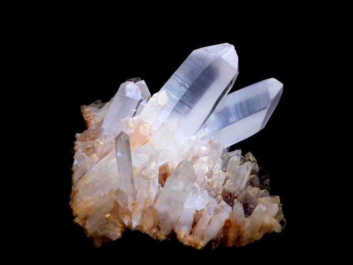 quartz quartz specimen on black background quartz is a seven on the mohs scale of hardness