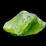 Peridot Crystals: Born of Fire and Light peridot crystal isolated on black