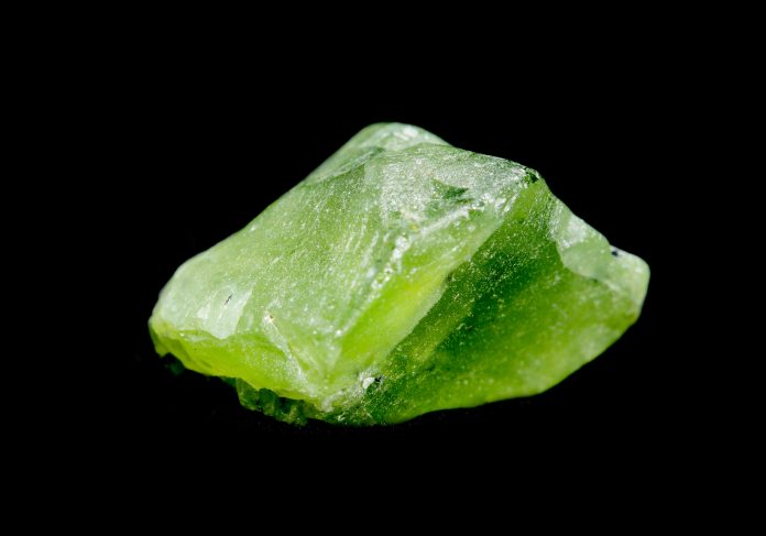 Peridot isolated on black peridot crystal isolated on black