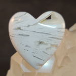 Heart-shaped Mexican lace agate cabochon.