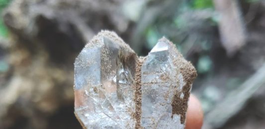 heart shaped herkimer diamond just dug from a vug