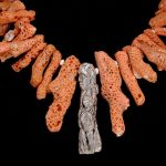 coral necklace made with these orange rocks and gemstones