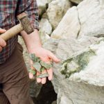 Connemara Marble: The Irish Gemstone Connemara marble pieces being held in a hand