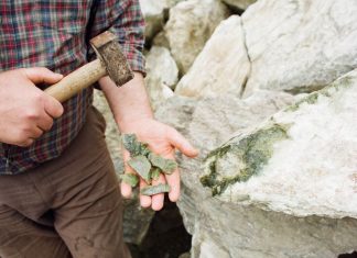 Connemara marble pieces being held in a hand
