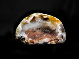 A colorful 1-inch Oco with secondari? and flame pattern in the shell.