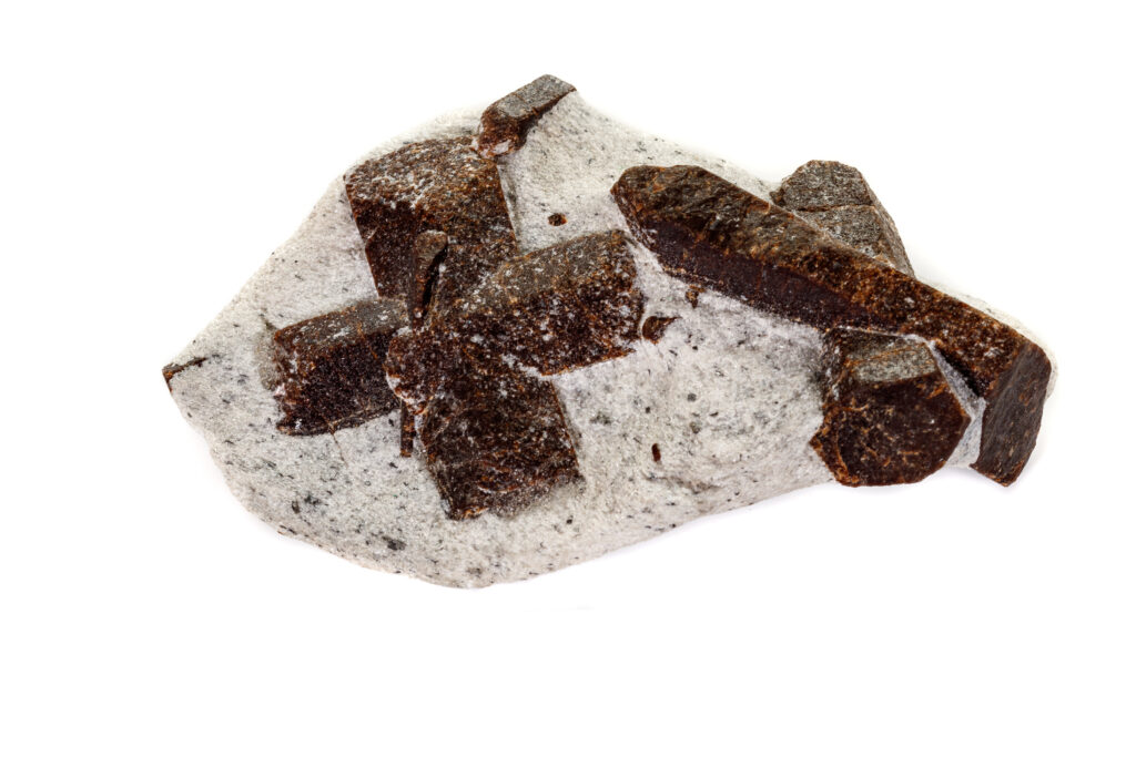 Staurolite on a white background close up 