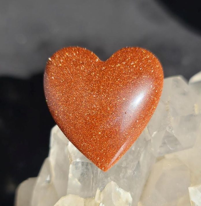 Gold Stone orange goldstone cabbed into a heart shape