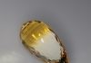 bi color citrine faceted in the acorn design