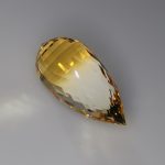 bi color citrine faceted in the acorn design