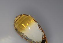 bi color citrine faceted in the acorn design