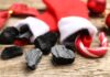 coal and a candy can in Christmas stockings
