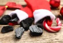 Coal or Diamonds in Your Stocking? coal and a candy can in Christmas stockings