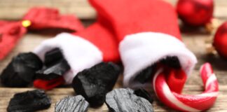 coal and a candy can in Christmas stockings