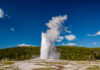 Eruption of Old Faithful geyser in Yellowstone National Park, Wyoming, USA
