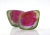 Watermelon Tourmaline Field Guide watermelon tourmalines pink and green polished and shiny on white background
