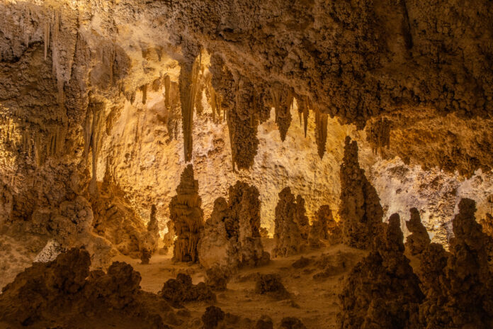 Limestone stalactites and stalagmites fill the caves of Carlsbad Caverns National Park, New Mexico. Limestone stalactites and stalagmites fill the caves of Carlsbad Caverns National Park, New Mexico.