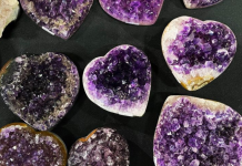 Amethyst heart-shaped stones carved as polished gemstone hearts