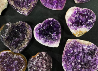 Amethyst heart-shaped stones carved as polished gemstone hearts