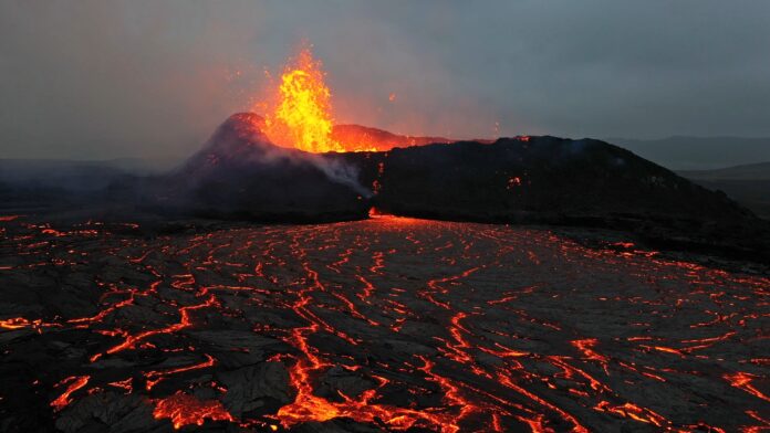 Icelandic volcano in eruption 2023. Icelandic volcano in eruption 2023. Detail of active crater with melting lava around.