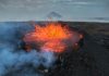 volcano exploding with magma flowing out producing volcanic rock