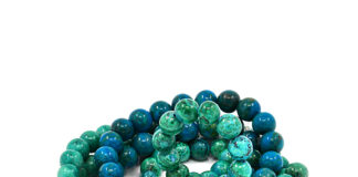 Green and blue Eilat Stone on a white background.