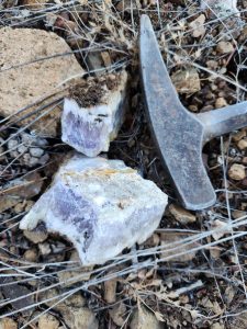 white quartz broken open for finding amethyst inside