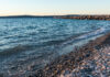 rocky Lake Michigan beach at sunset
