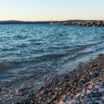 rocky Lake Michigan beach at sunset