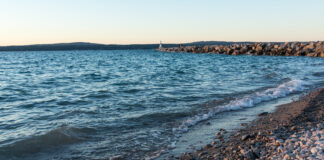 rocky Lake Michigan beach at sunset