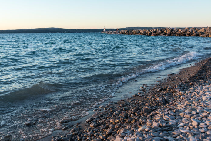 rocky Lake Michigan beach at sunset