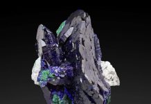 dramatic Millpillas specimen with intense blue color in its large crystals and malachite underneath