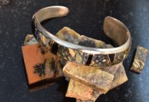 yellow, black, and blue-grey australian dendritic opal bracelet made setting opals without prongs